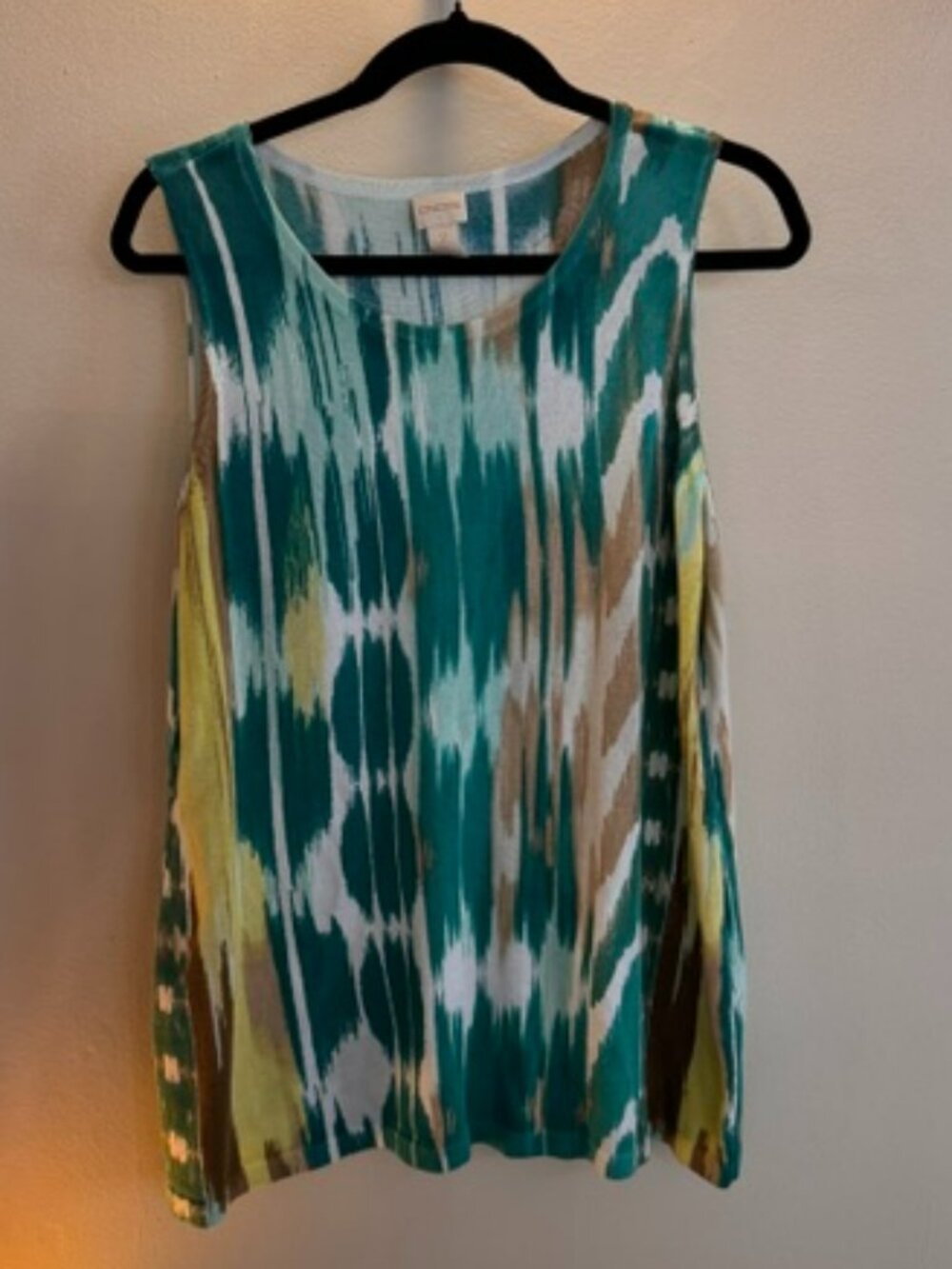 Chico's sleeveless tank sweater features a green and white ikat pattern